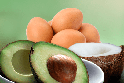 Image of eggs, a coconut and avocados.