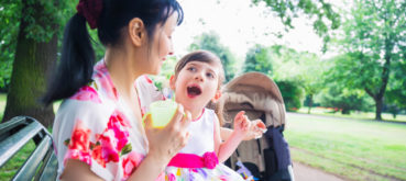 a mother holds her daughter, who has cerebral palsy