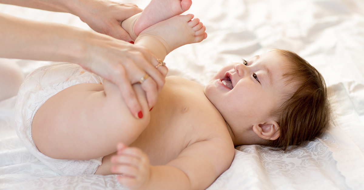 Mother playing with baby